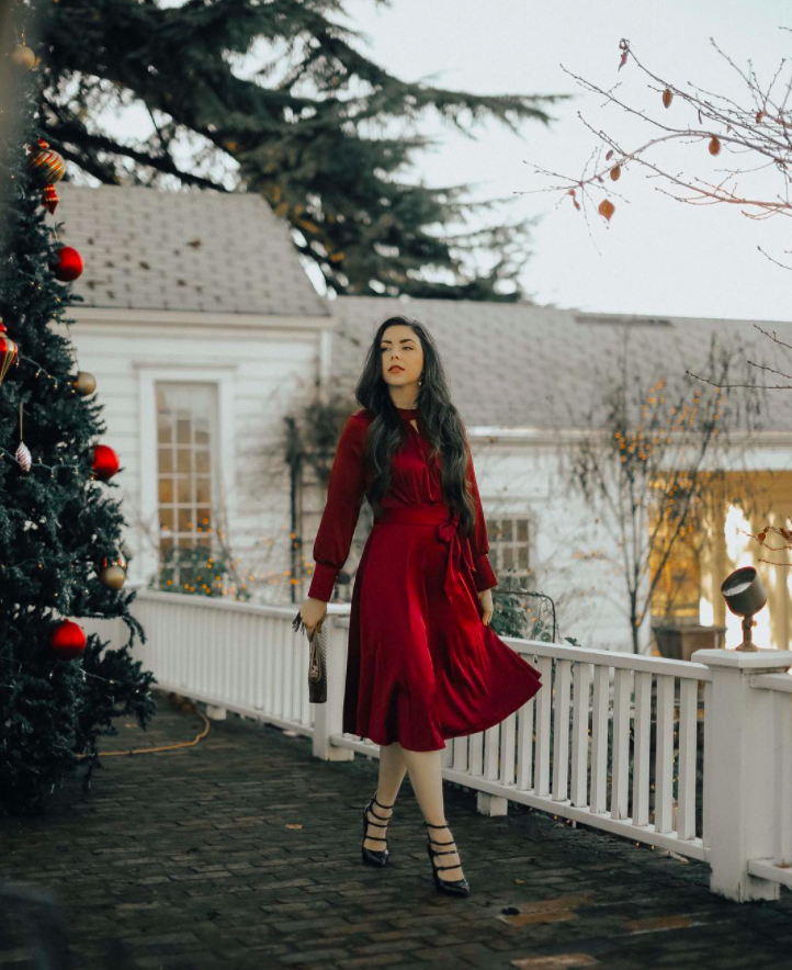 blogger wearing the red holiday dress