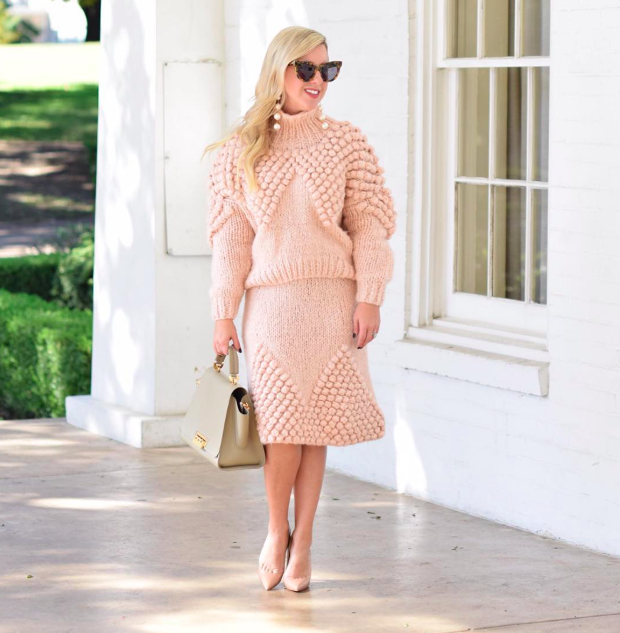 blogger wearing cozy-chic matching beige pink sweater and skirt set